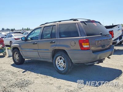 Drugie zdjęcie samochodu z przodu: 2002 JEEP GRAND CHEROKEE LAREDO VIN:1J8GX48S12C121959 - miniatura