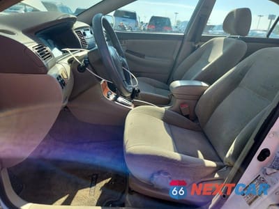 Zdjęcie 7 z 12 samochodu: 2004 TOYOTA COROLLA LE VIN:1NXBR32E94Z281668 - miniatura