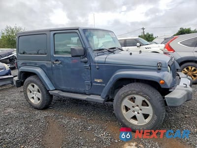Czwarte zdjęcie samochodu z boku: 2008 JEEP WRANGLER SAHARA VIN:1J4FA54158L567140 - miniatura