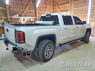 Trzecie zdjęcie samochodu z tyłu: 2017 GMC SIERRA K1500 DENALI VIN:3GTU2PEJ3HG137964 - miniatura