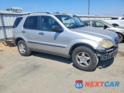 Czwarte zdjęcie samochodu z boku: 1998 MERCEDES-BENZ ML 320 VIN:4JGAB54E8WA037507 - miniatura