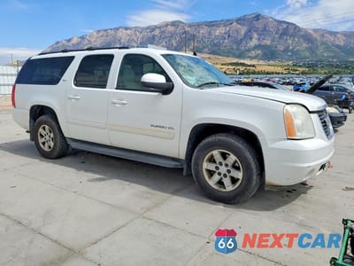 Czwarte zdjęcie samochodu z boku: 2010 GMC YUKON XL K1500 SLT VIN:1GKUKKE3XAR257906 - miniatura