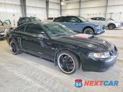 Czwarte zdjęcie samochodu z boku: 2002 FORD MUSTANG GT VIN:1FAFP42X32F182273 - miniatura