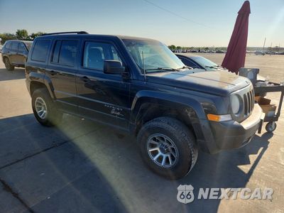 Czwarte zdjęcie samochodu z boku: 2014 JEEP PATRIOT SPORT VIN:1C4NJRBB1ED520620 - miniatura