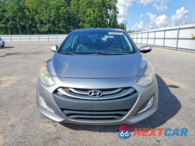 Piąte zdjęcie samochodu w środku: 2013 HYUNDAI ELANTRA GT BASE VIN:KMHD35LE2DU048297 - miniatura