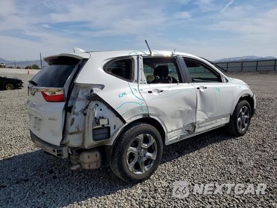 Trzecie zdjęcie samochodu z tyłu: 2019 HONDA CR-V EX VIN:5J6RW2H5XKL017529 - miniatura