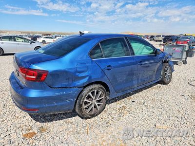 Trzecie zdjęcie samochodu z tyłu: 2018 VOLKSWAGEN JETTA SE VIN:3VWDB7AJ6JM259325 - miniatura