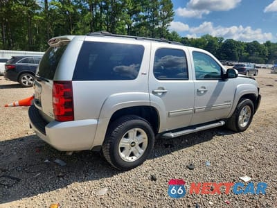 Trzecie zdjęcie samochodu z tyłu: 2010 CHEVROLET TAHOE K1500 LT VIN:1GNUKBE05AR122065 - miniatura