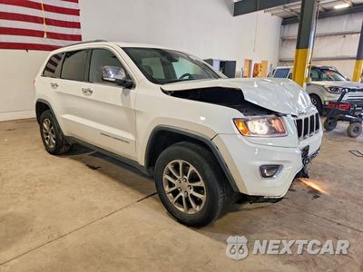 Czwarte zdjęcie samochodu z boku: 2014 JEEP GRAND CHEROKEE LIMITED VIN:1C4RJFBG0EC546031 - miniatura