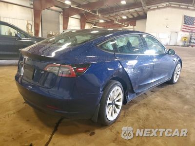 Trzecie zdjęcie samochodu z tyłu: 2023 TESLA MODEL 3 VIN:5YJ3E1EA4PF581391 - miniatura