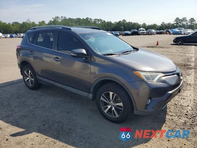 Czwarte zdjęcie samochodu z boku: 2018 TOYOTA RAV4 XLE VIN:2T3WFREV1JW443854 - miniatura
