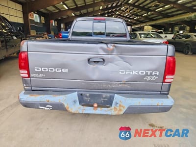 Zdjęcie 6 z 12 samochodu: 2004 DODGE DAKOTA SXT VIN:1D7FL16K44S533484 - miniatura