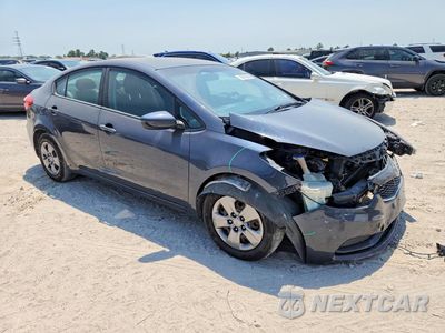 Czwarte zdjęcie samochodu z boku: 2016 KIA FORTE LX VIN:KNAFK4A61G5617156 - miniatura