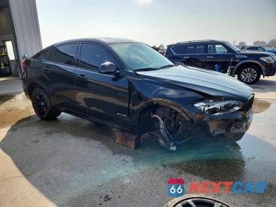 Czwarte zdjęcie samochodu z boku: 2019 BMW X6 SDRIVE35I VIN:5UXKU0C58K0H98773 - miniatura