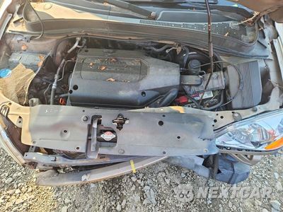Zdjęcie 12 z 14 samochodu: 2004 HONDA PILOT EX VIN:2HKYF18454H614677 - miniatura