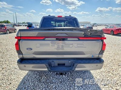 Zdjęcie 6 z 12 samochodu: 2022 FORD F150 LIGHTNING PRO VIN:1FTVW1EL2NWG05493 - miniatura