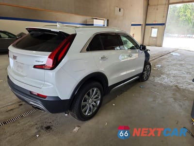 Trzecie zdjęcie samochodu z tyłu: 2023 CADILLAC XT4 PREMIUM LUXURY VIN:1GYFZDR42PF127413 - miniatura
