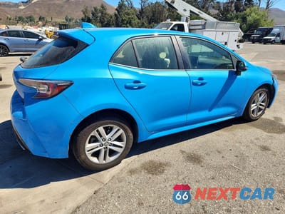 Trzecie zdjęcie samochodu z tyłu: 2019 TOYOTA COROLLA HATCHBACK SE VIN:JTNK4RBE4K3001143 - miniatura