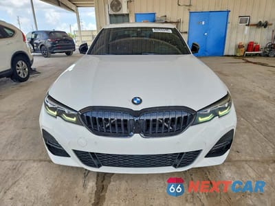 Piąte zdjęcie samochodu w środku: 2022 BMW 330I VIN:3MW5R1J09N8C51707 - miniatura