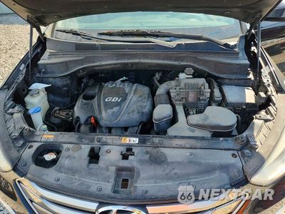 Zdjęcie 11 z 12 samochodu: 2016 HYUNDAI SANTA FE SPORT 2.4L VIN:5XYZU3LB0GG357001 - miniatura
