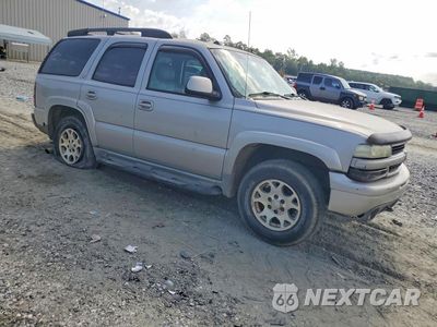 Czwarte zdjęcie samochodu z boku: 2004 CHEVROLET TAHOE K1500 VIN:1GNEK13T74R184180 - miniatura