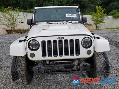 Piąte zdjęcie samochodu w środku: 2014 JEEP WRANGLER UNLIMITED SAHARA VIN:1C4HJWEG8EL182450 - miniatura