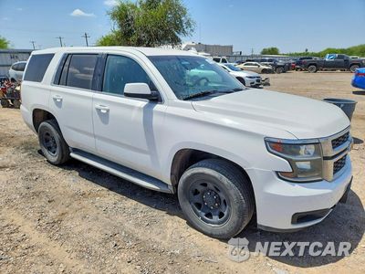 Czwarte zdjęcie samochodu z boku: 2016 CHEVROLET TAHOE POLICE VIN:1GNSKDEC0GR264216 - miniatura