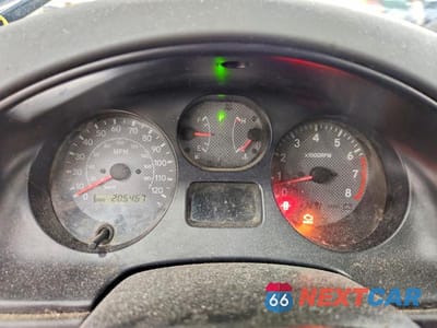 Zdjęcie 9 z 13 samochodu: 2000 TOYOTA RAV4 BASE VIN:JT3HP10V5Y7151844 - miniatura
