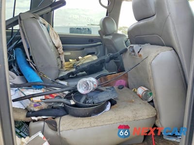 Zdjęcie 11 z 13 samochodu: 2003 GMC YUKON XL C1500 VIN:1GKEC16T13J145569 - miniatura