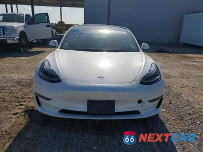 Piąte zdjęcie samochodu w środku: 2021 TESLA MODEL 3 VIN:5YJ3E1EB6MF992702 - miniatura