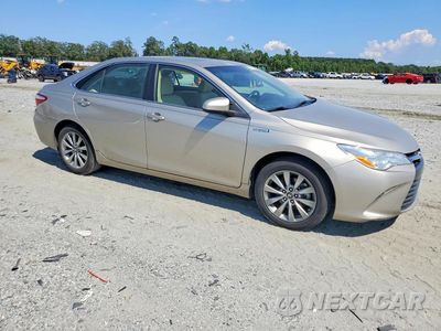 Czwarte zdjęcie samochodu z boku: 2017 TOYOTA CAMRY HYBRID XLE VIN:4T1BD1FK9HU218823 - miniatura