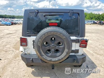 Zdjęcie 6 z 13 samochodu: 2015 JEEP WRANGLER UNLIMITED SAHARA VIN:1C4HJWEGXFL567204 - miniatura