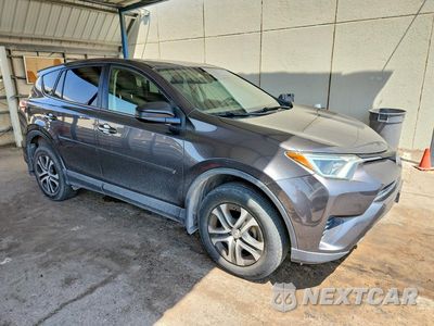 Czwarte zdjęcie samochodu z boku: 2018 TOYOTA RAV4 LE VIN:JTMZFREV5JJ752755 - miniatura