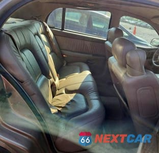 Zdjęcie 10 z 12 samochodu: 2000 BUICK PARK AVENUE VIN:1G4CW52K2Y4150909 - miniatura