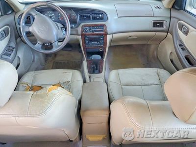 Zdjęcie 8 z 12 samochodu: 2004 NISSAN ALTIMA GXE VIN:1N4DL01A6YC112723 - miniatura