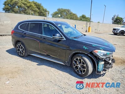 Czwarte zdjęcie samochodu z boku: 2020 BMW X1 XDRIVE28I VIN:WBXJG9C08L5R06147 - miniatura
