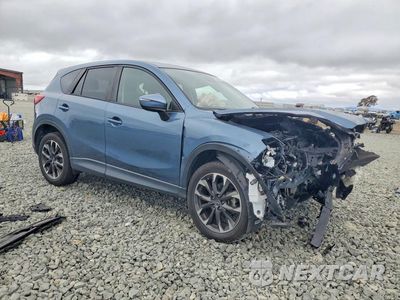 Czwarte zdjęcie samochodu z boku: 2016 MAZDA CX-5 GT VIN:JM3KE2DY9G0750357 - miniatura