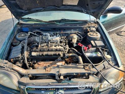 Zdjęcie 11 z 12 samochodu: 2000 SUZUKI ESTEEM GL VIN:JS2GB41W9Y5184510 - miniatura
