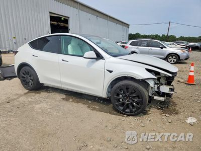 Czwarte zdjęcie samochodu z boku: 2021 TESLA MODEL Y VIN:5YJYGDEE4MF212319 - miniatura