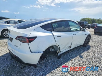 Trzecie zdjęcie samochodu z tyłu: 2023 TESLA MODEL Y VIN:7SAYGDEE2PA081024 - miniatura