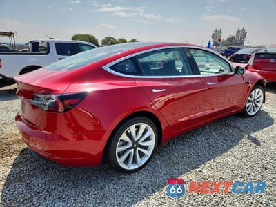 Trzecie zdjęcie samochodu z tyłu: 2018 TESLA MODEL 3 VIN:5YJ3E1EA5JF012234 - miniatura