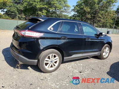 Trzecie zdjęcie samochodu z tyłu: 2017 FORD EDGE SEL VIN:2FMPK4J96HBB66199 - miniatura