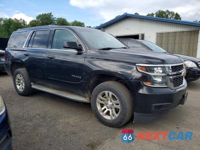 Czwarte zdjęcie samochodu z boku: 2015 CHEVROLET TAHOE K1500 LT VIN:1GNSKBKC1FR663823 - miniatura