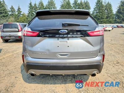 Zdjęcie 6 z 13 samochodu: 2022 FORD EDGE TITANIUM VIN:2FMPK4K97NBA39536 - miniatura