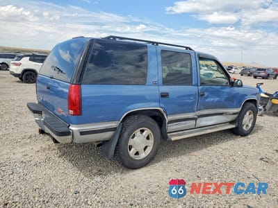 Trzecie zdjęcie samochodu z tyłu: 1995 GMC YUKON VIN:1GKEK13K8SJ743137 - miniatura