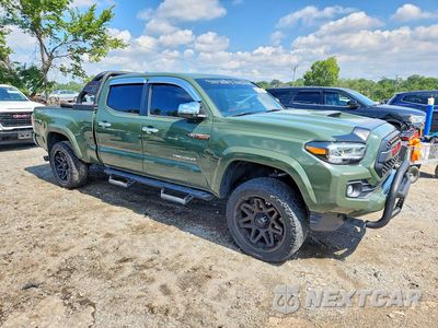 Czwarte zdjęcie samochodu z boku: 2021 TOYOTA TACOMA TRD SPORT VIN:3TYDZ5BN9MT003354 - miniatura