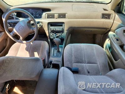 Zdjęcie 8 z 12 samochodu: 1999 TOYOTA CAMRY LE VIN:4T1BG22KXXU606225 - miniatura