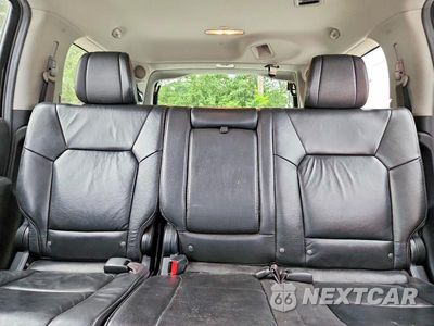 Zdjęcie 10 z 13 samochodu: 2013 HONDA PILOT TOURING VIN:5FNYF4H91DB026058 - miniatura
