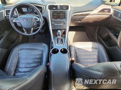 Zdjęcie 8 z 12 samochodu: 2013 FORD FUSION SE PHEV VIN:3FA6P0PU7DR386801 - miniatura