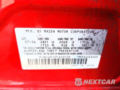 Zdjęcie 12 z 12 samochodu: 2007 MAZDA 3 I VIN:JM1BK32F371610128 - miniatura